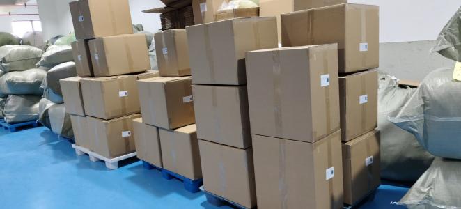 Cartoned curtain orders palletised for container loading